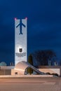 Statue of Heroic Aviators near Air Force museum at night