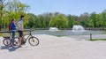 Debrecen Hungary 04 19 2019 young couple ride a bike and enjoy the nice weather in Debrecen in the Great Forest park