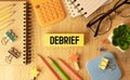 debrief word in a dictionary. debrief concept Royalty Free Stock Photo