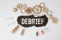 debrief word in a dictionary. debrief concept Royalty Free Stock Photo