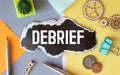 debrief word in a dictionary. debrief concept. Royalty Free Stock Photo