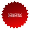 DEBRIEFING on red sticker label. Royalty Free Stock Photo
