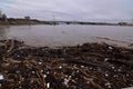 Debris floating against a dock on the mississippi river near downtown st.louis
