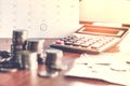 Debt collection and tax season concept with deadline calendar remind note,coins,banks,calculator on table Royalty Free Stock Photo