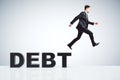 Debt concept with businessman escapes from debts Royalty Free Stock Photo