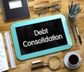 Debt Consolidation - Text on Small Chalkboard. 3D. Royalty Free Stock Photo