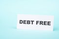 Debt free in process, ending credit payments and bank loans, financial freedom, message on paper