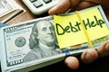 Debt help concept. Hand holding stack of money Royalty Free Stock Photo