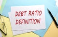 DEBT RATIO DEFINITION text on paper on the colorful paper background