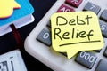 Debt relief. Money and calculator on a desk Royalty Free Stock Photo