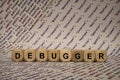 Debugger - cube with letters and words from the computer, software, internet categories, wooden cubes