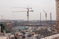 18 Dec,2014 Beijing. Work activity on a construction site in City with cranes and workers Royalty Free Stock Photo