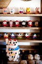 Daruma and Maneki Neko Dolls in Souvenir shop, Narita, Japan