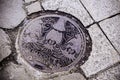 Hakodate manhole sewage cover on street - Japanese Unique manhole cover lid Royalty Free Stock Photo
