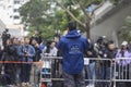 Police media liaison officers manage and control media work arrangements outside the West Kowloon magistrates courts. Royalty Free Stock Photo