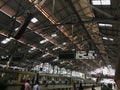 local train Indicator and Unidentified people inside Chhatrapati Shivaji Maharaj Terminus a unesco world heritage site Mumbai, Royalty Free Stock Photo