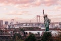 Odaiba Rainbow bridge with Tokyo bay view at evening sunset sky with tourists Royalty Free Stock Photo