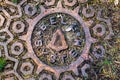 Dec 28, 2019 Woodside / CA / USA - Close up of weathered Bell System sign on a manhole in the woods, signalling that telephone