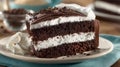 Decadent Chocolate Cake Slice with Creamy Frosting Layers and Chocolate Shavings Royalty Free Stock Photo