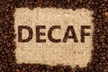 Decaf concept on brown coffee bag background