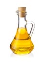 Decanter with farm organic vegetable oil, on white background.