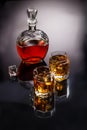 Decanter and two glasses with whisky and ice Royalty Free Stock Photo