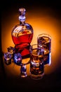 Decanter and two glasses with whisky and ice Royalty Free Stock Photo