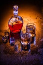 Decanter and two glasses with whisky and ice Royalty Free Stock Photo