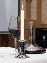 Decanter, wine glass, candle for wine tasting