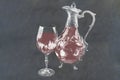 Decanter and wine glass with red wine on slate Royalty Free Stock Photo