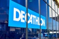 Decathlon sign on a store wall.