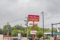 Checkers street sign and cloudy sky Royalty Free Stock Photo