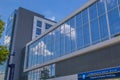 Reflections of the clouds and sky in the glass windows of a building Royalty Free Stock Photo