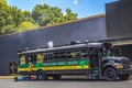 View of an urban Jamaican Food Truck with a smoking grill close up