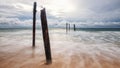 Decay wooden bridge and motion wave, Pilai beach