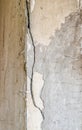 decayed and broken internal wall of the old house with the peeled-off yellow paint Royalty Free Stock Photo
