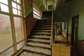 Staircase in an abandoned old school building