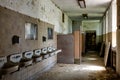 Crumbling Bathroom with Sinks - Abandoned Hospital Royalty Free Stock Photo