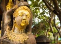 Golden wooden statue in Lamphun