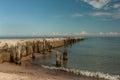 A decaying old concrete breakwater