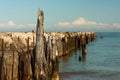 A decaying old concrete breakwater