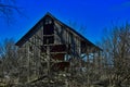 Abandoned Barn through the brush at Weldon Springs State Park and Natural Area