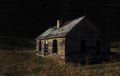 decaying settlers home with stars above Royalty Free Stock Photo