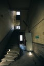 Decaying Stairway: Inside View of Abandoned Industrial Building\'s Staircase