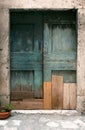 Decaying Turquoise Wooden Door
