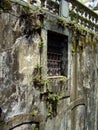 The decaying wall with a barred window in Ouro Preto Minas Gerais Brazil Royalty Free Stock Photo