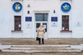 December 5, 2021 Beltsy, Moldova. The back of a woman going to the polls. A polling station in a typical school