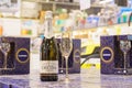 December 2, 2021 Beltsy Moldova. A glass of champagne and a bottle of sparkling wine on a supermarket shelf