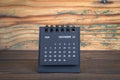 2020 DECEMBER. Black paper calendar on a wooden table. Time plannin Royalty Free Stock Photo