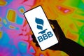 December 22, 2023, Brazil. The Better Business Bureau (BBB) logo is displayed on a smartphone screen